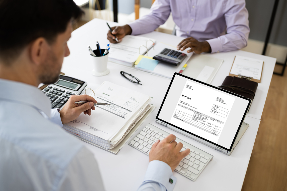 Tax,account,using,calculator,for,audit,and,compliance